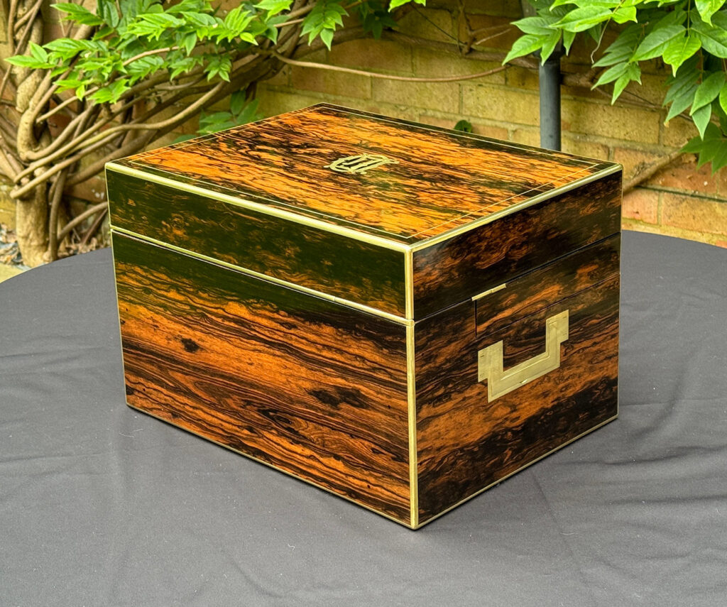 Rear left view of a Large Antique Jewellery Box in Coromandel with Cantilever Mechanism.