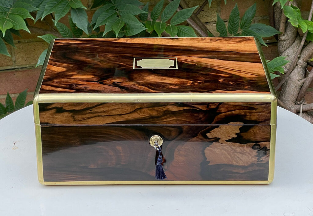 Front view of an Antique Jewellery Box in Calamander.