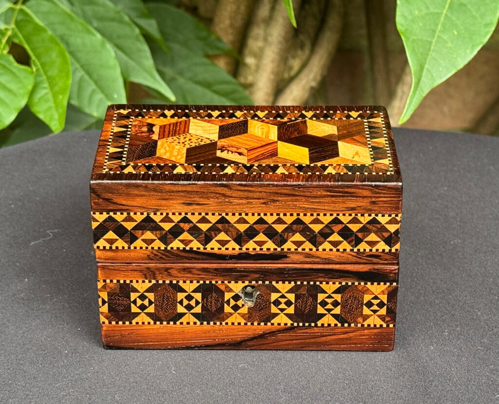 Front head-on view of an Antique Miniature Jewellery Box with Parquetry Inlay.