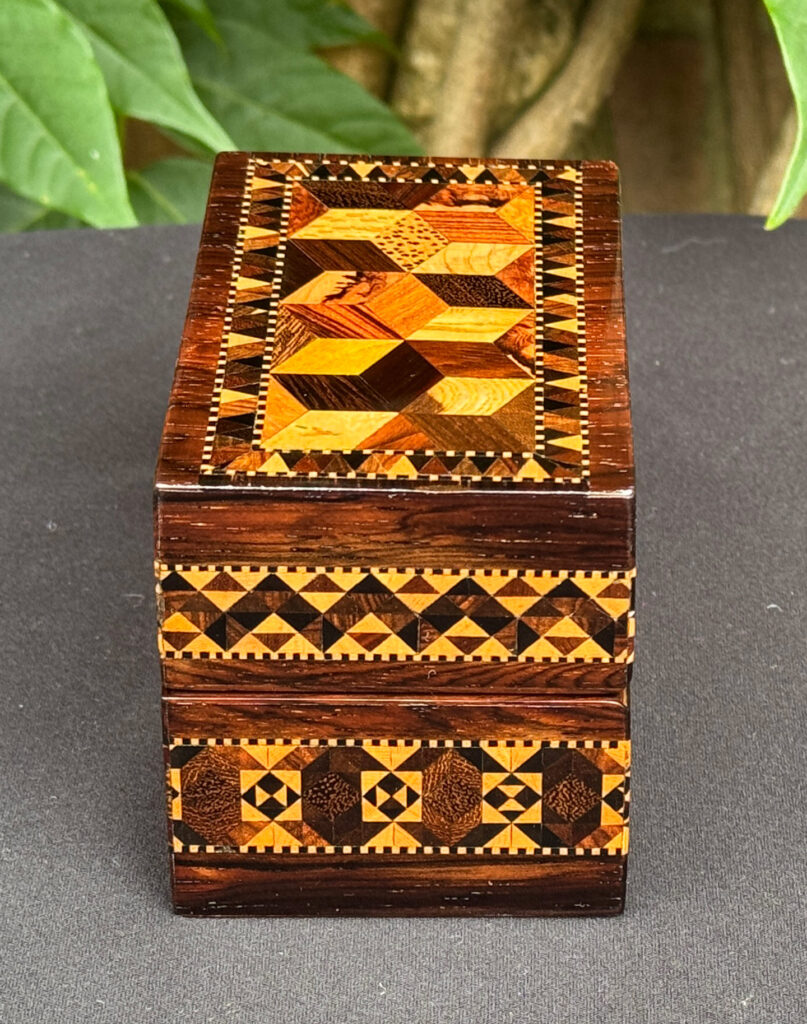 Right side view of an Antique Miniature Jewellery Box with Parquetry Inlay.