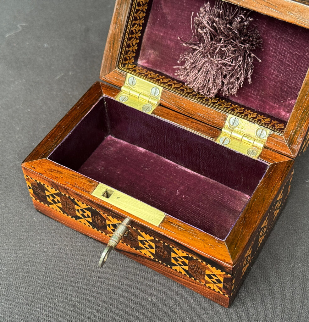 Front right overhead internal view of an Antique Miniature Jewellery Box with Parquetry Inlay.