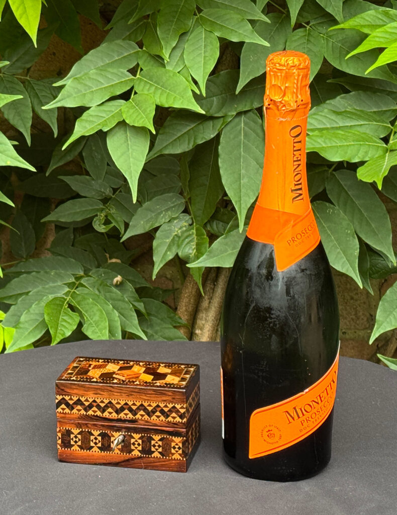 Size comparison of an Antique Miniature Jewellery Box with Parquetry Inlay.