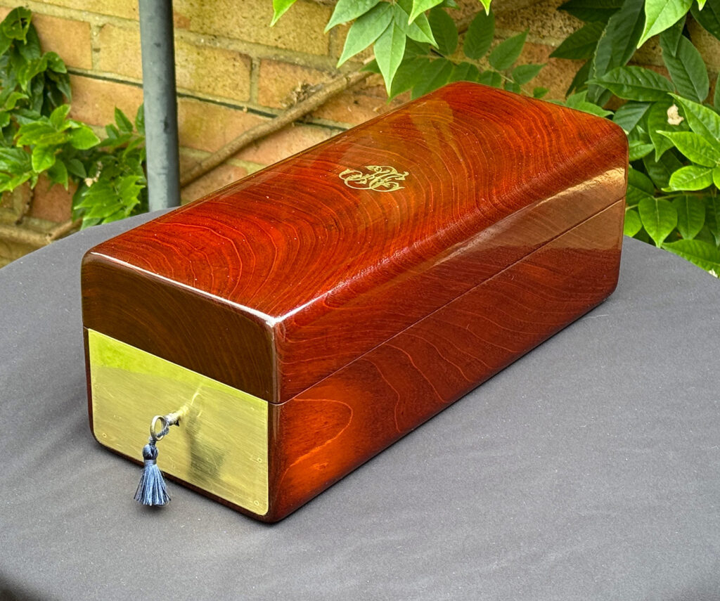 Front right view of a French Antique Travelling Jewellery in Mahogany, by Aucoc Ainé.
