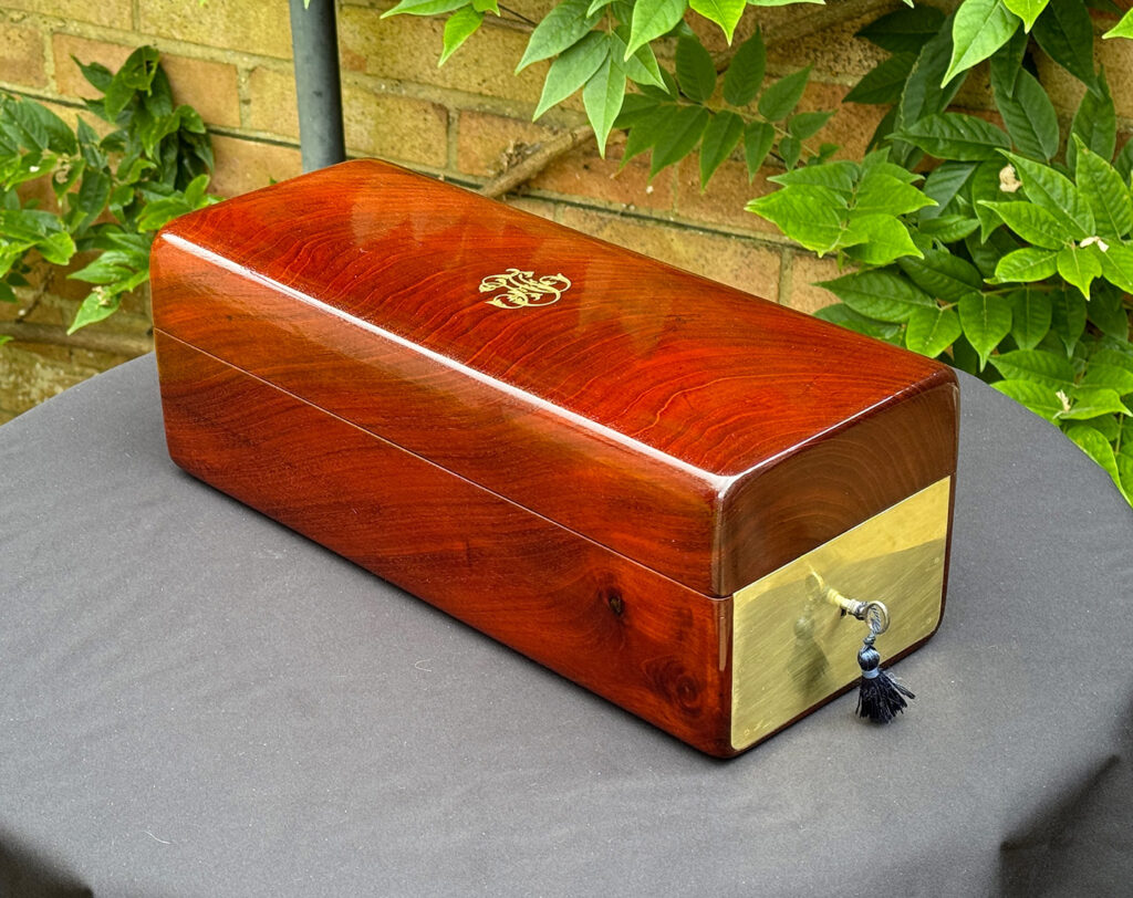 Front left view of a French Antique Travelling Jewellery in Mahogany, by Aucoc Ainé.