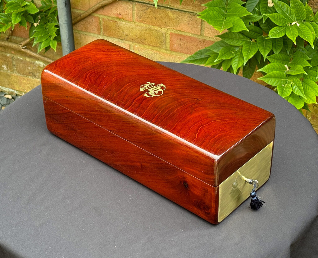 Front left overhead view of a French Antique Travelling Jewellery in Mahogany, by Aucoc Ainé.