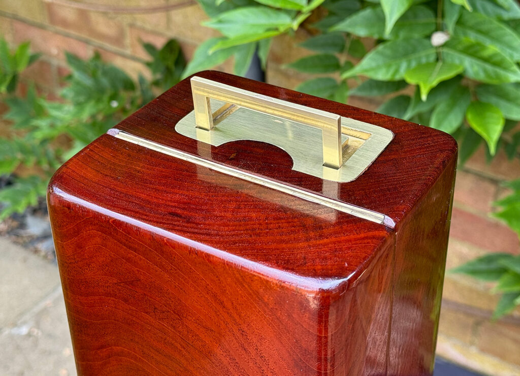 Close up of open handle from a French Antique Travelling Jewellery in Mahogany, by Aucoc Ainé.
