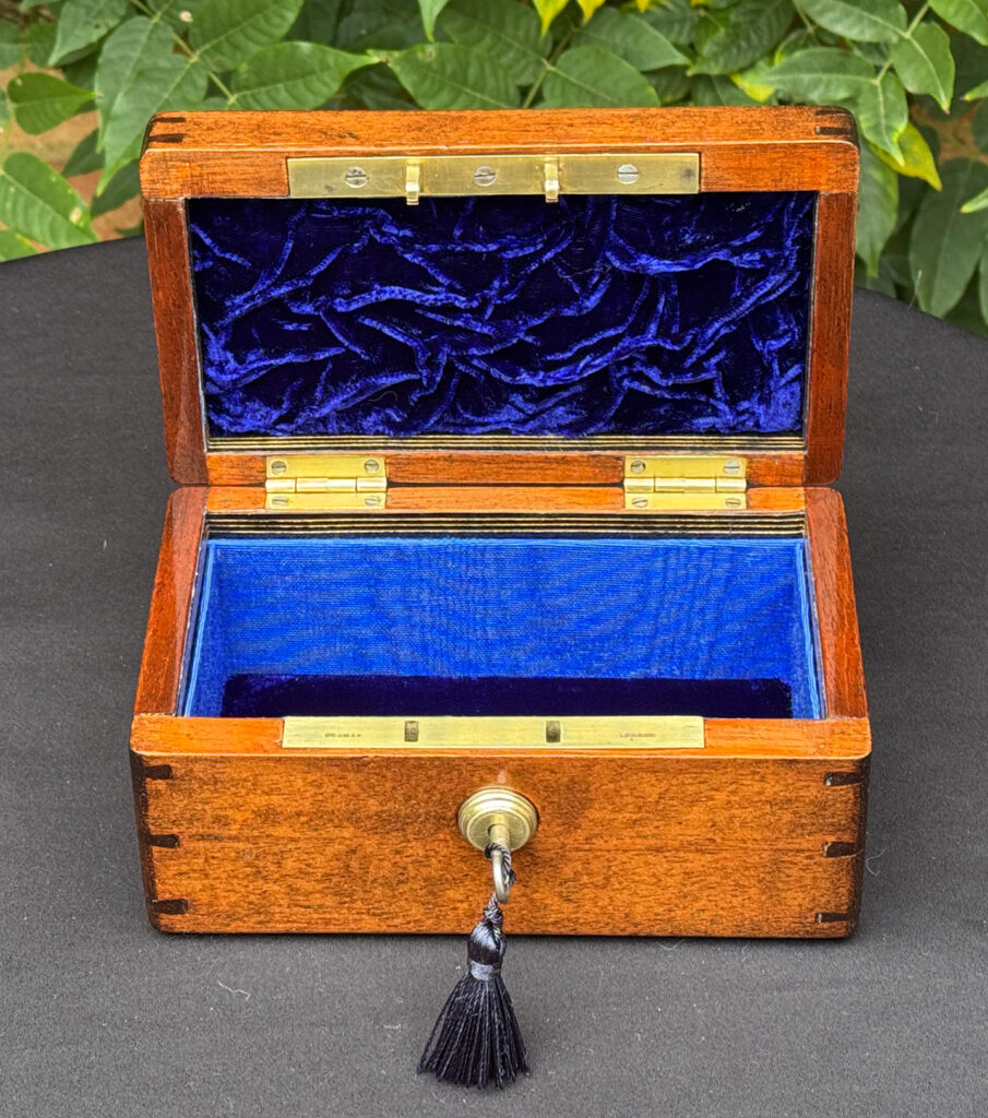 Front internal view of a Miniature Antique Jewellery Box in Mahogany with Bramah Lock.
