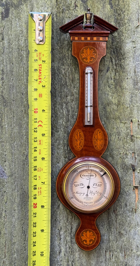Measurement of the full height of an Antique Salesman Sample Miniature 9.5” Barometer.