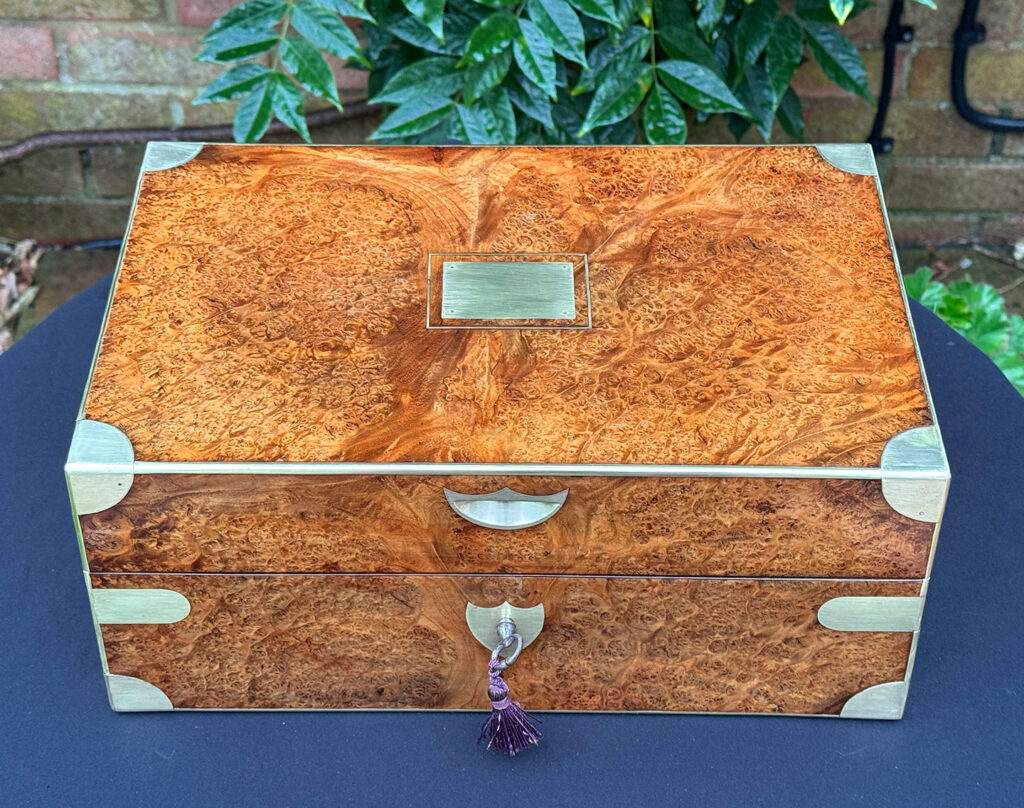Overhead view of a French Antique Jewellery Box in Burr Elm.