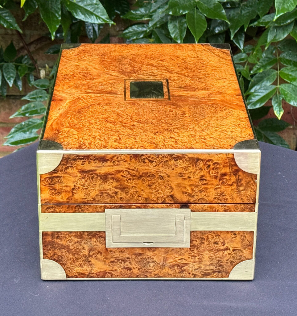 Left side view of a French Antique Jewellery Box in Burr Elm.