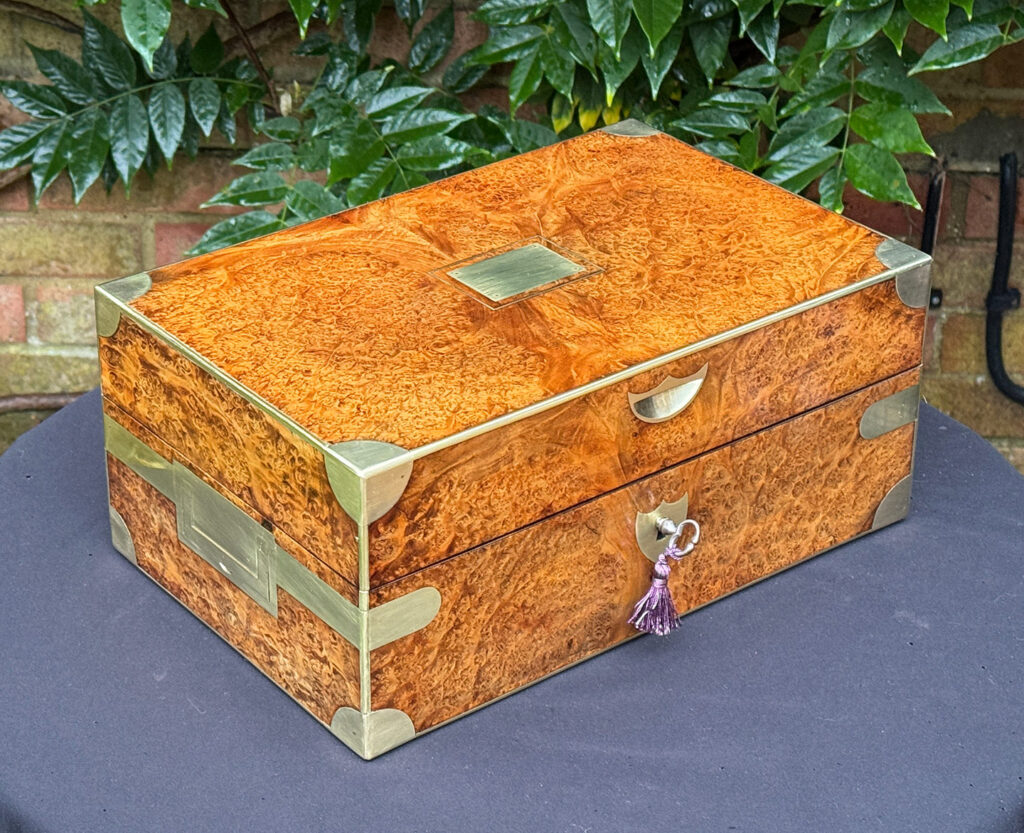 Front left view of a French Antique Jewellery Box in Burr Elm.