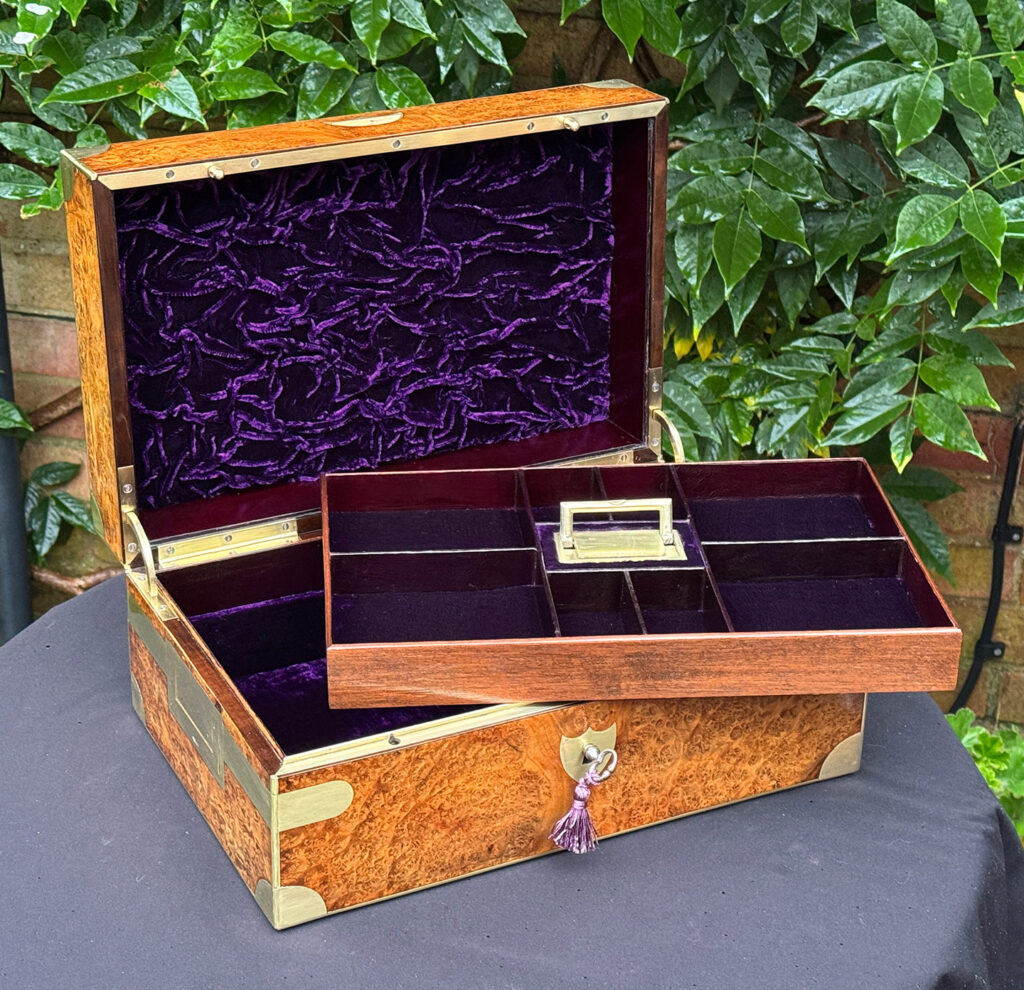 Front left internal view of a French Antique Jewellery Box in Burr Elm with tray removed.