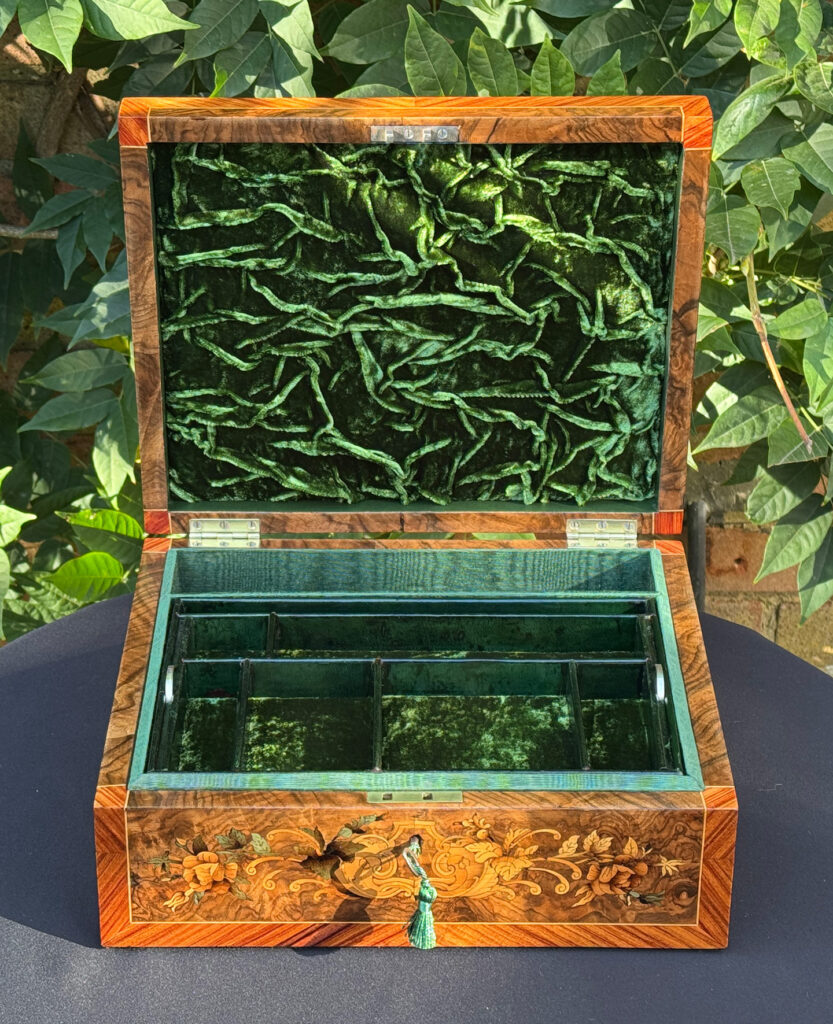 Front internal view of an antique Georgian jewellery box in burr walnut & kingwood with floral marquetry inlay.