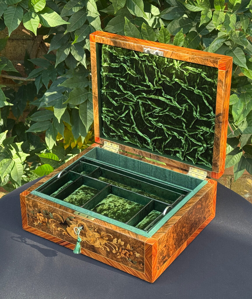 Front right internal view of an antique Georgian jewellery box in burr walnut & kingwood with floral marquetry inlay.