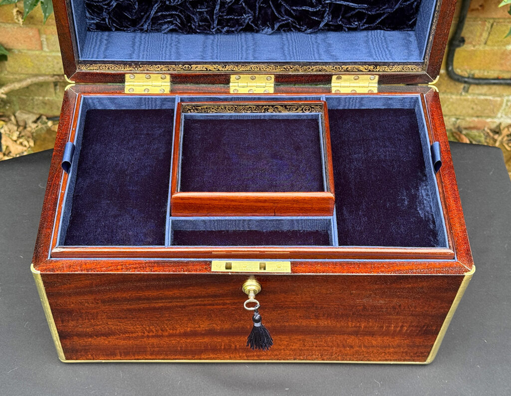 Closer overhead view of a large antique gentleman’s travelling jewellery box in Cuban mahogany.