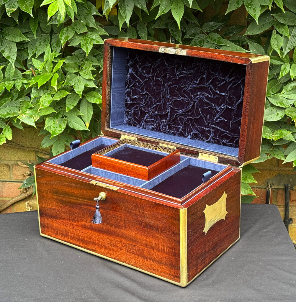 Front right internal view of a large antique gentleman’s travelling jewellery box in Cuban mahogany.