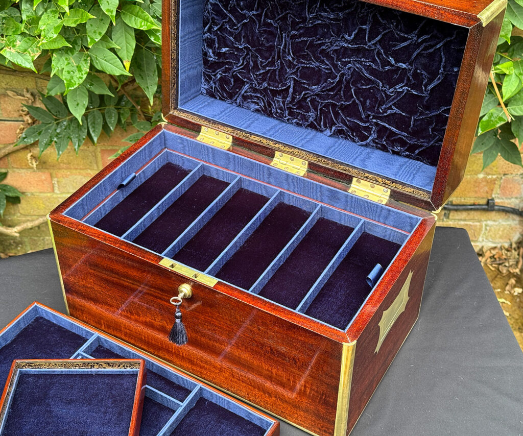 Closer view of the second tray from a large antique gentleman’s travelling jewellery box in Cuban mahogany.