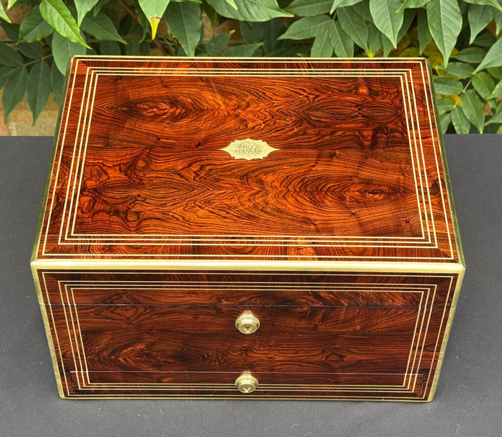 Front overhead view of an antique jewellery box in kingwood, by Halstaff & Hannaford.