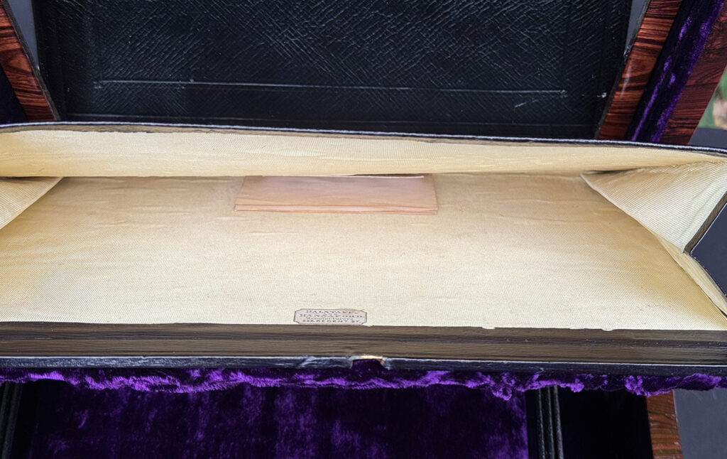 Interior view of the concealed letter wallet from an antique jewellery box in kingwood, by Halstaff & Hannaford.