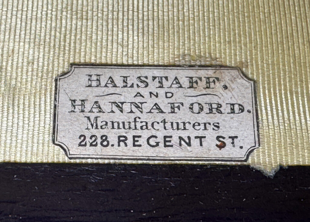 Paper retailer's label belonging to Halstaff & Hannaford.