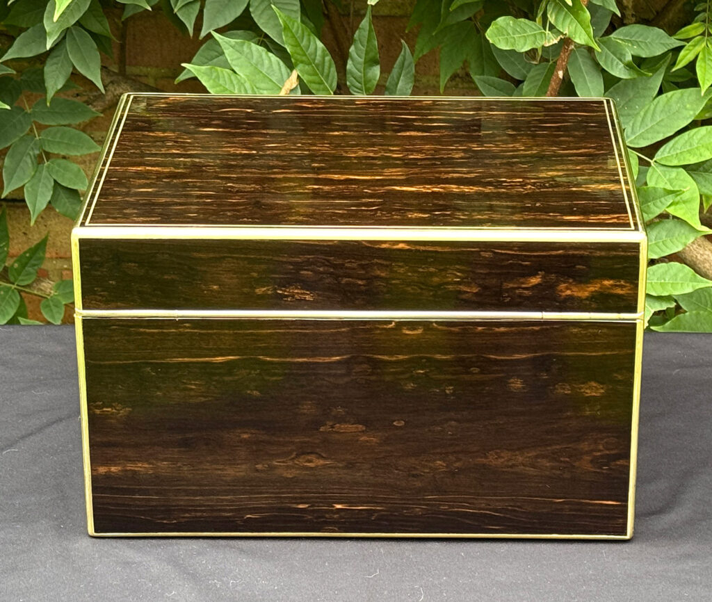 Rear view of an antique jewellery box in coromandel, by Charles Asprey.