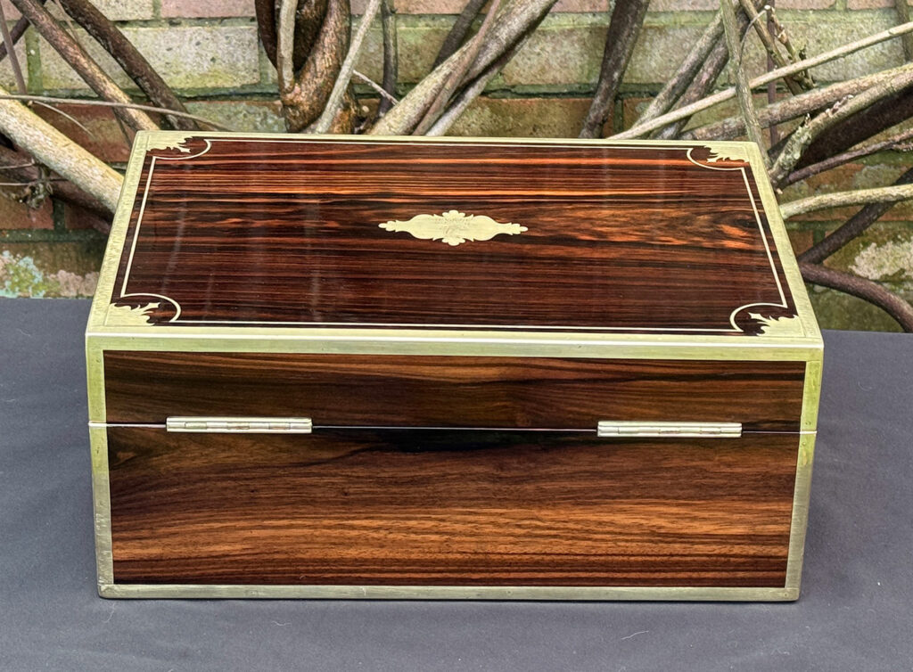 Rear view of an antique jewellery box in calamander, by George Lawrence.