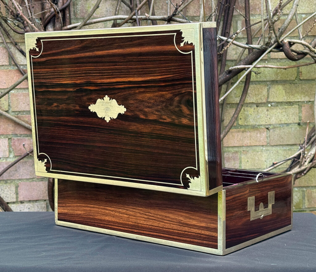 Rear opened view of an antique jewellery box in calamander, by George Lawrence.