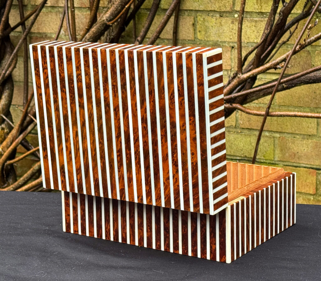 Rear opened view of an antique Edwardian cigar box in thuya wood with ivory striped inlay.