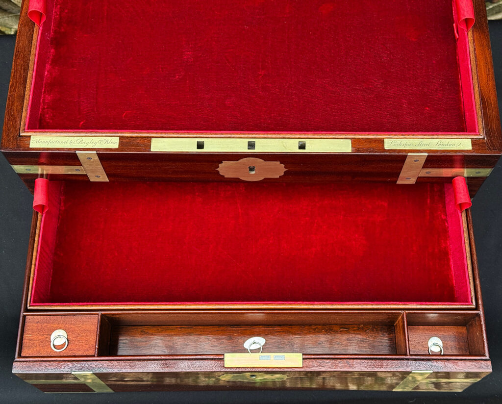 Overhead interior view of a large antique gentleman’s travelling jewellery box in Cuban mahogany, by Bayley & Blew.