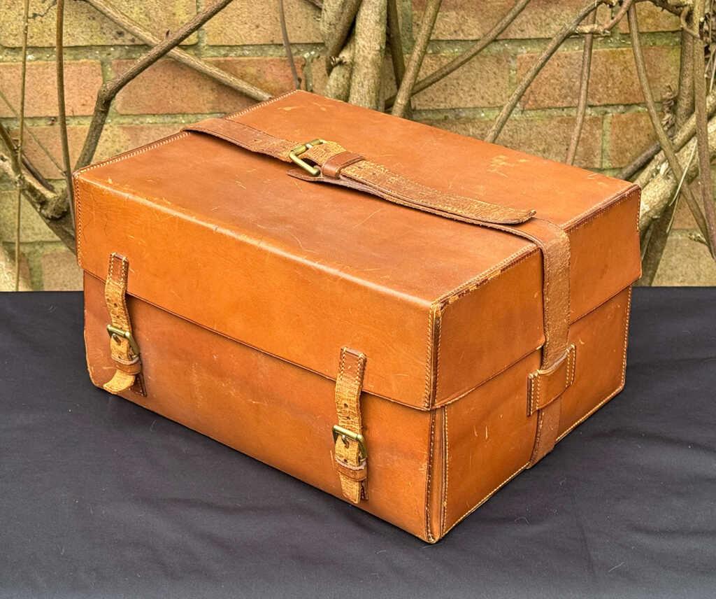 Front right view of the outer leather case from an antique jewellery box in kingwood, by Wells & Lambe.