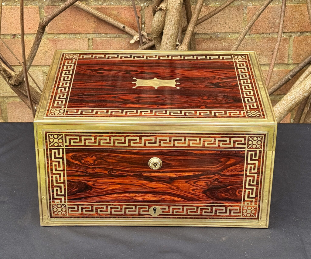 Front view of an antique jewellery box in kingwood, by Wells & Lambe.