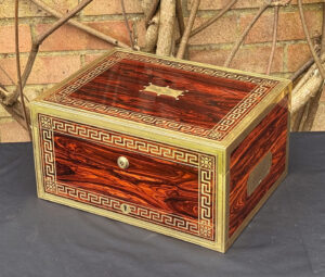Front right view of an antique jewellery box in kingwood, by Wells & Lambe.