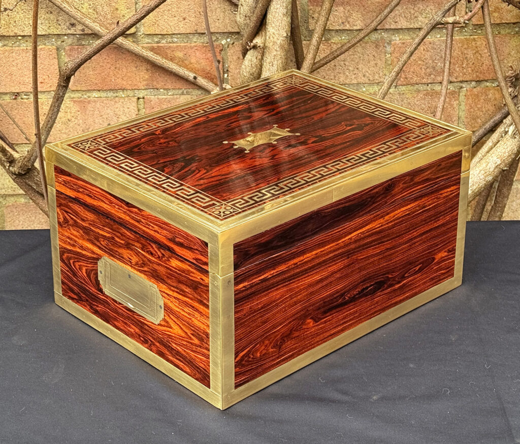 Rear right view of an antique jewellery box in kingwood, by Wells & Lambe.