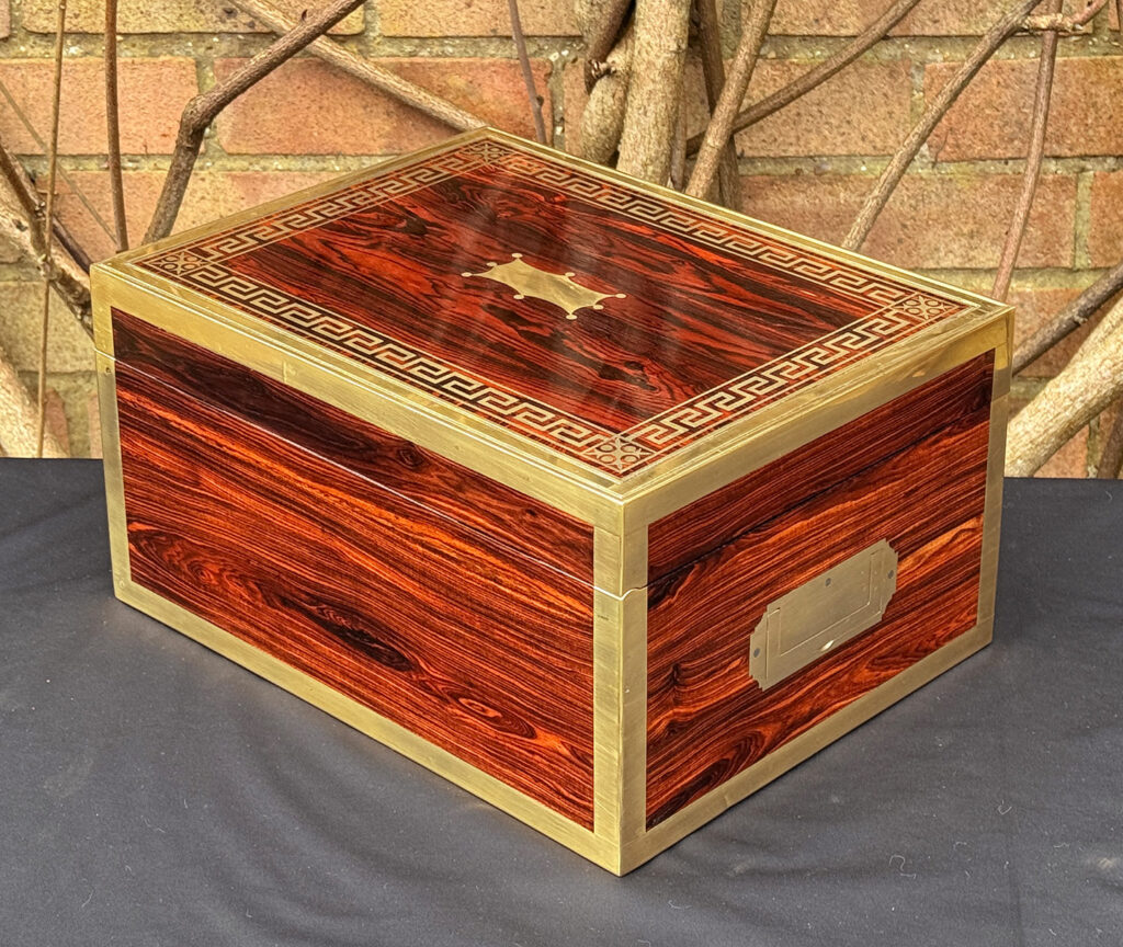 Rear left view of an antique jewellery box in kingwood, by Wells & Lambe.