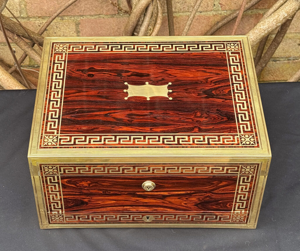 Overhead view of an antique jewellery box in kingwood, by Wells & Lambe.
