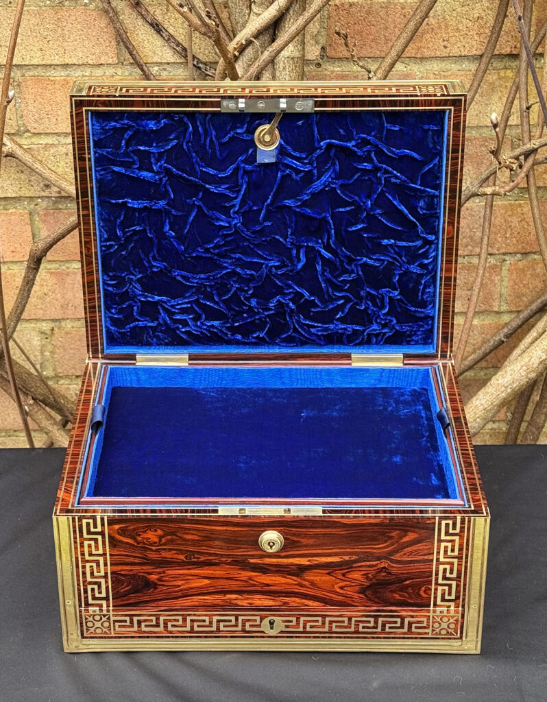 Front interior view of an antique jewellery box in kingwood, by Wells & Lambe.