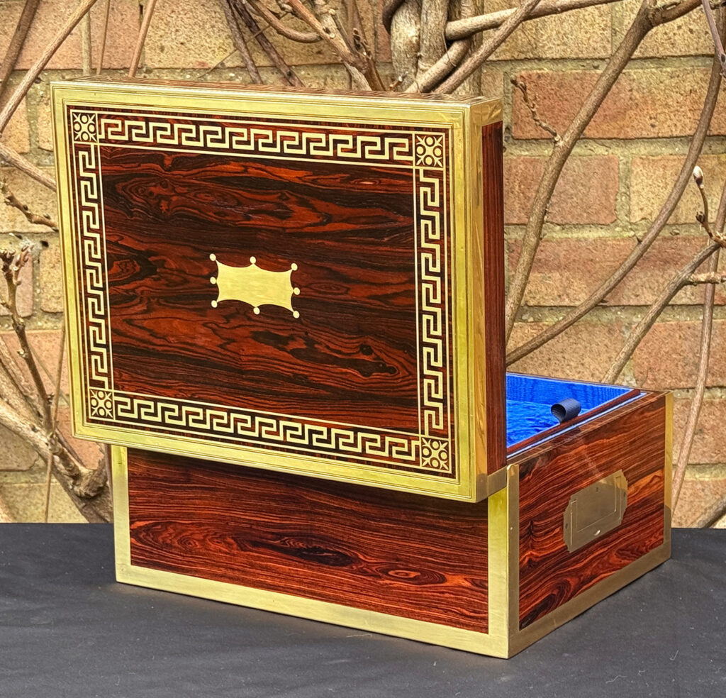 Rear opened view of an antique jewellery box in kingwood, by Wells & Lambe.