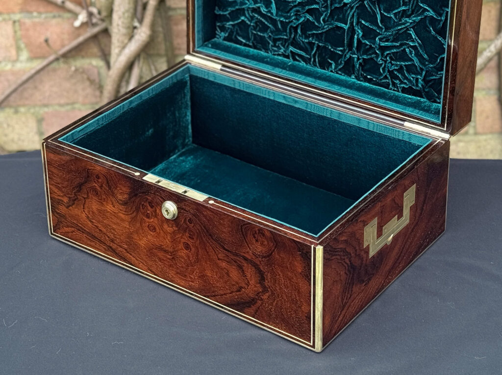 Closer interior view of an antique jewellery box in rosewood, by Edwards.