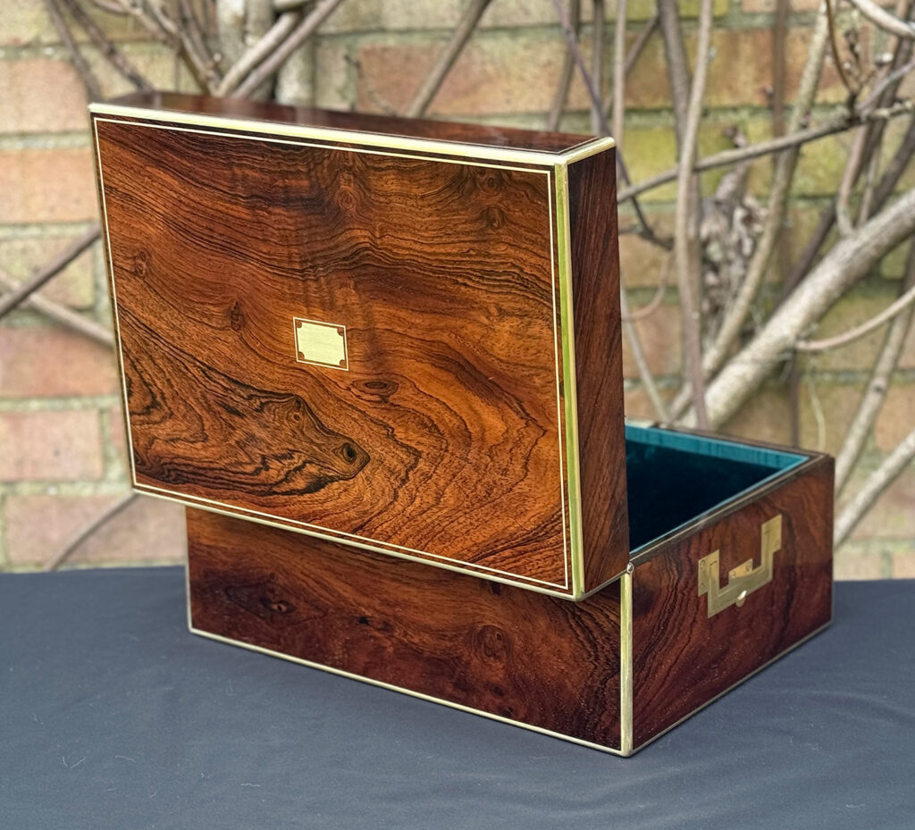 Rear opened view of an antique jewellery box in rosewood, by Edwards.