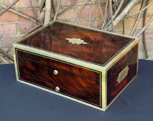 Front right view of a large antique jewellery and writing Box in rosewood with naval heritage, attributed to Edwards.