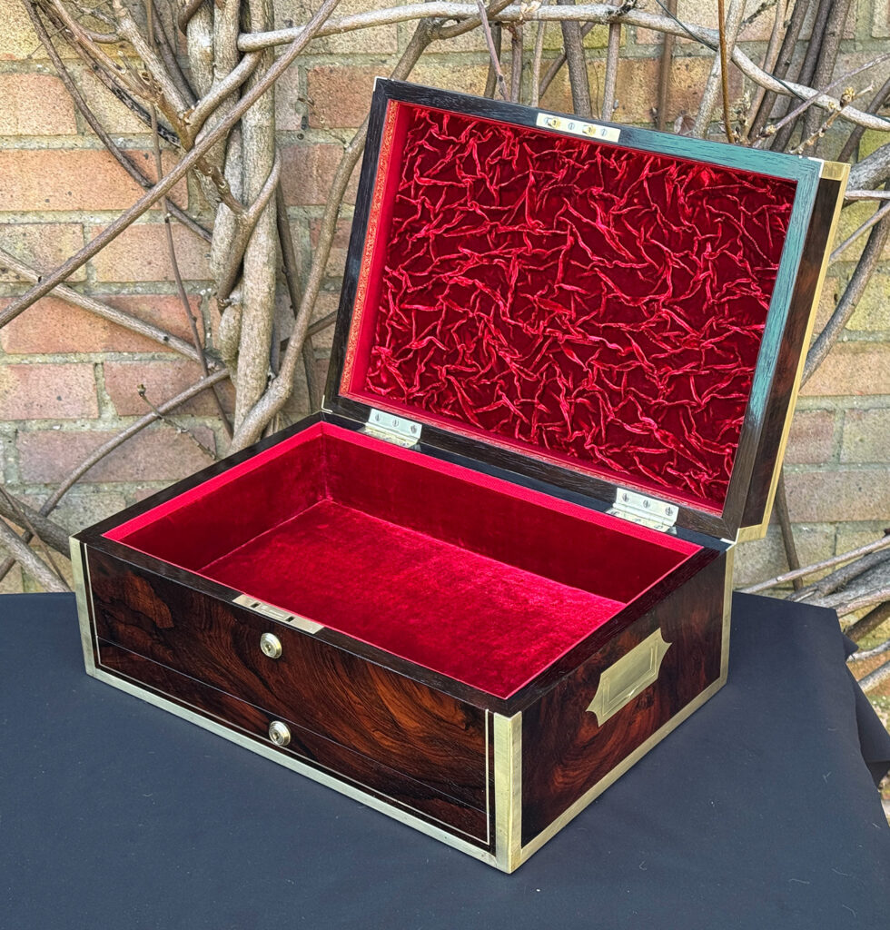Front right interior view of a large antique jewellery and writing Box in rosewood with naval heritage, attributed to Edwards.