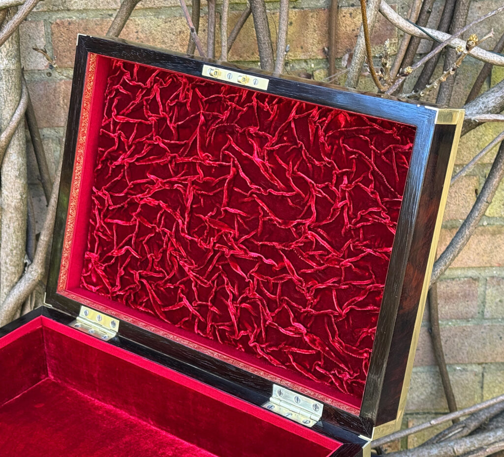 Closer interior view of a large antique jewellery and writing Box in rosewood with naval heritage, attributed to Edwards.