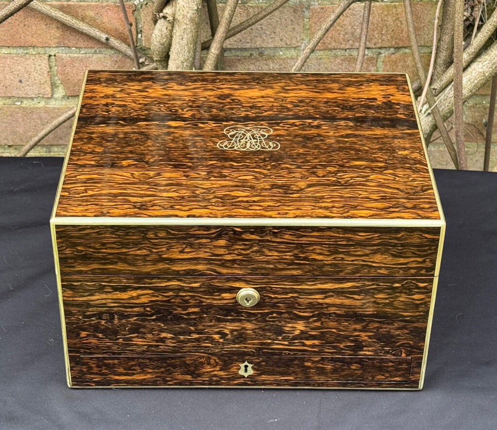 Overhead view of an antique jewellery box in coromandel by Halstaff & Hannaford.
