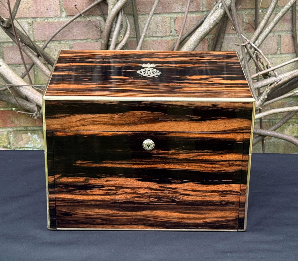 Front view of an antique jewellery box in calamander - A wedding gift to the Duchess of St. Albans.
