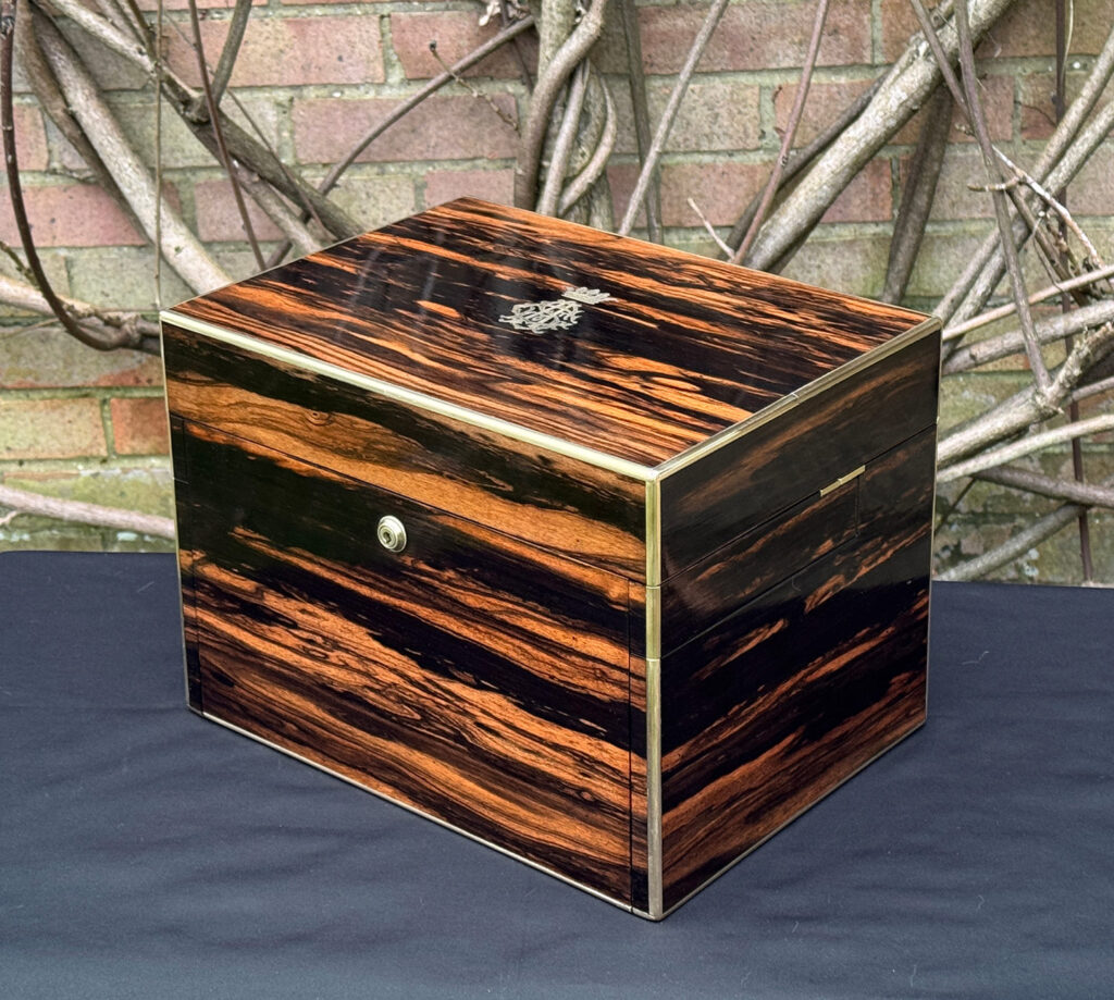 Front right view of an antique jewellery box in calamander - A wedding gift to the Duchess of St. Albans.