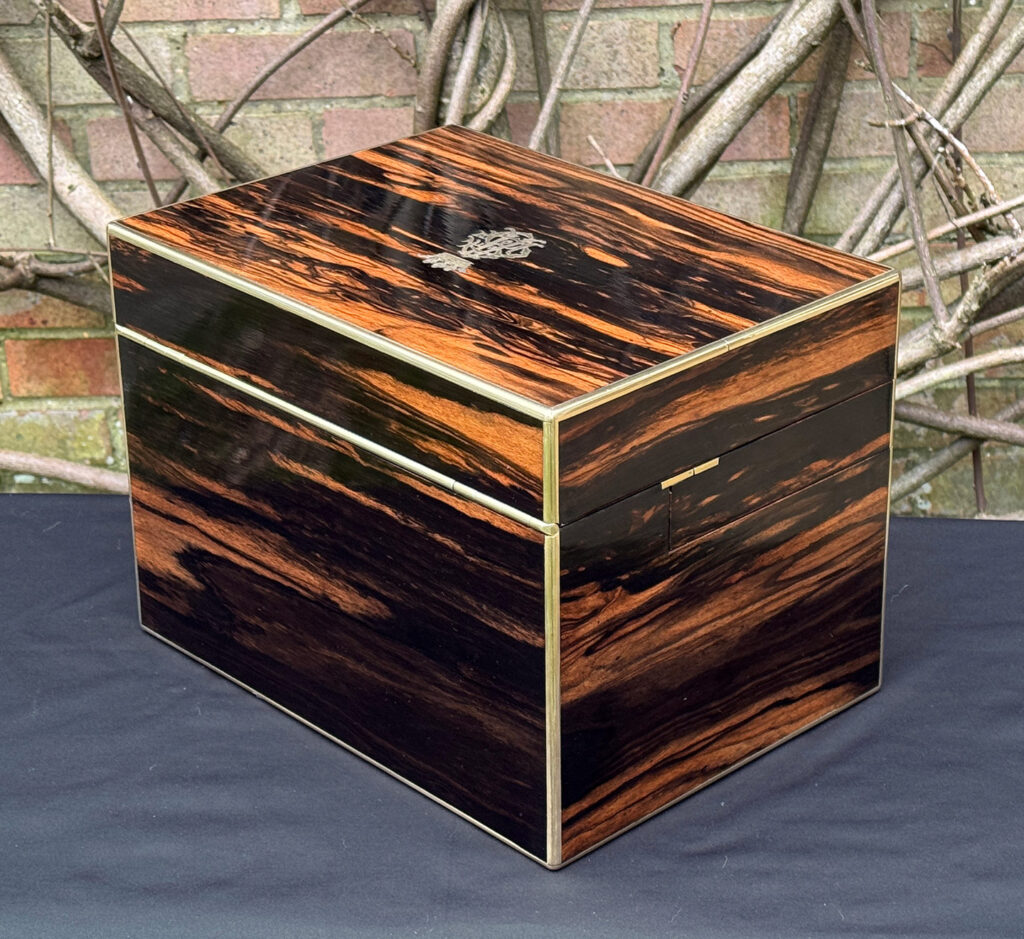 Rear left view of an antique jewellery box in calamander - A wedding gift to the Duchess of St. Albans.