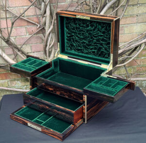 Front right interior fully opened view of an antique jewellery box in calamander - A wedding gift to the Duchess of St. Albans.