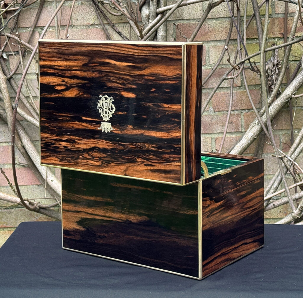Rear opened view of an antique jewellery box in calamander - A wedding gift to the Duchess of St. Albans.