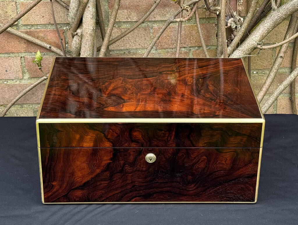 Front view of a large antique document & jewellery box in rosewood by Edwards.