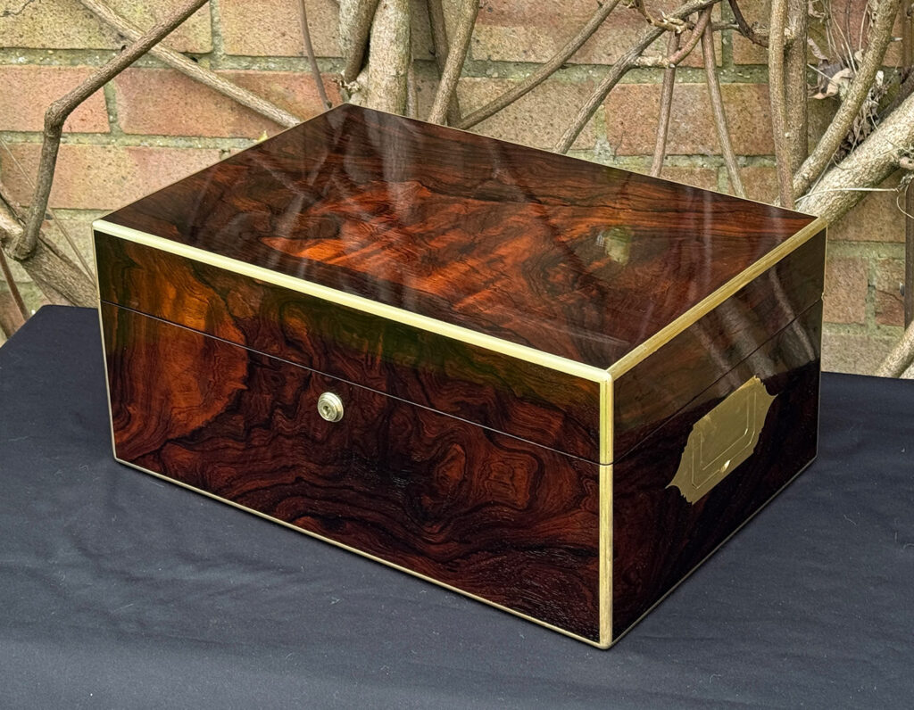 Front right view of a large antique document & jewellery box in rosewood by Edwards.